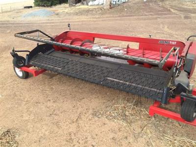 Photo 1. Case IH 3016 pickup Windrower Front
