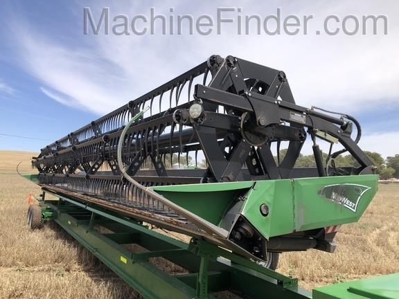 John Deere S690 harvester front