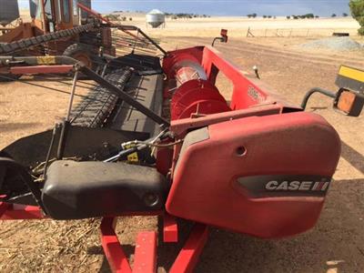 Photo 2. Case IH 3016 pickup Windrower Front