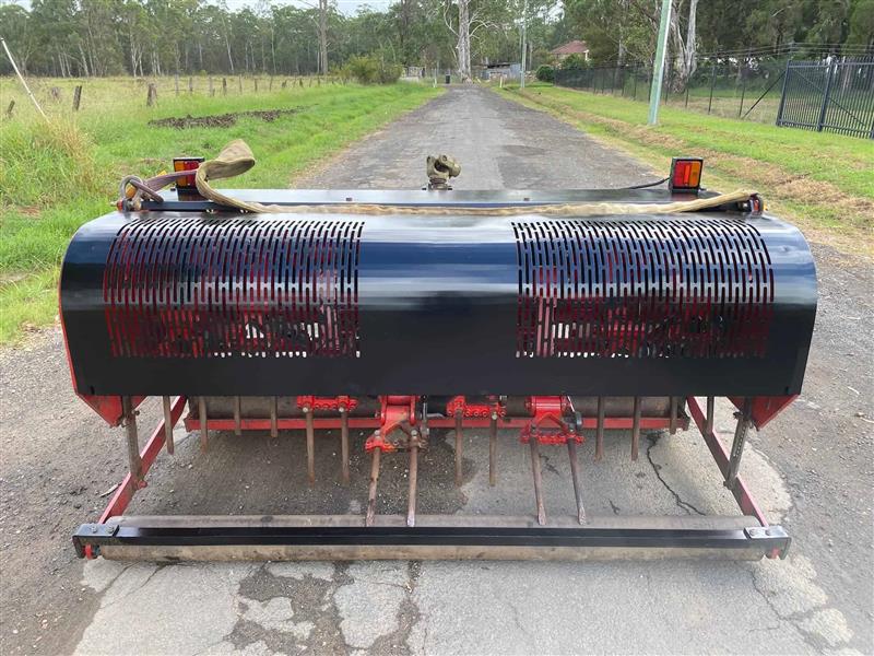 Photo 2. Verti Drain 7521 PTO linkage aerator