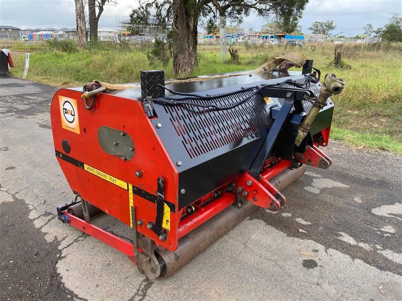 Photo 4. Verti Drain 7521 PTO linkage aerator