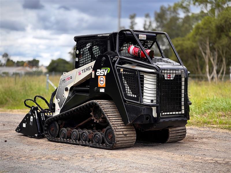Photo 3. Terex PT100G a/c cab forestry high flow posi track skid steer loader
