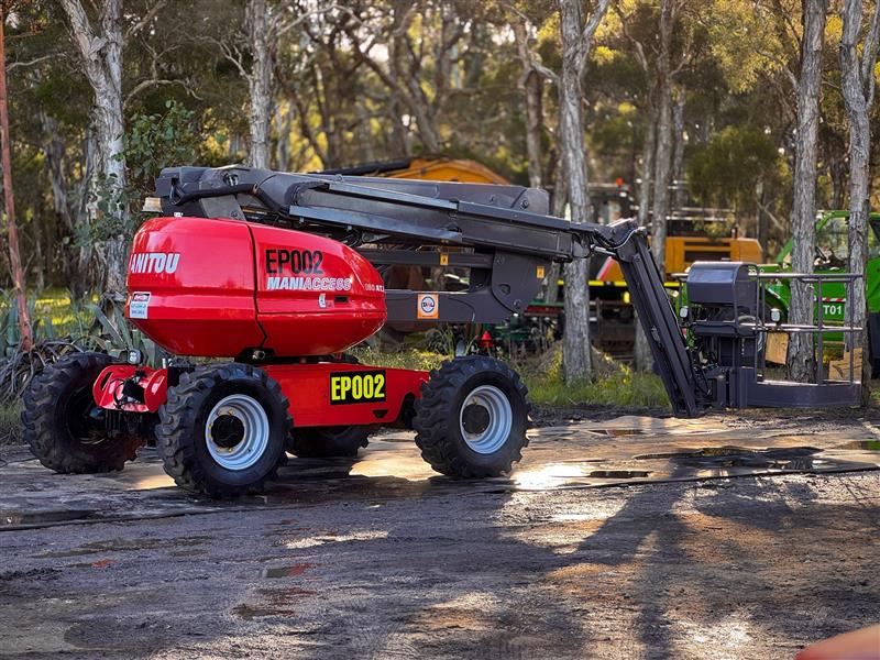 Photo 5. Manitou 160 ATJ all terrain boom scissor lift elevated work platform