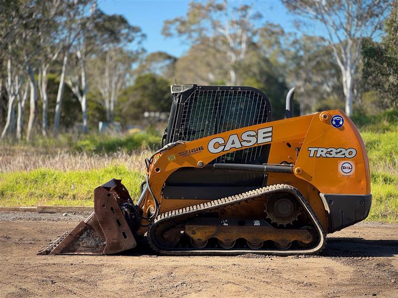 Photo 3. Case TR320 Positrack skid steer loader