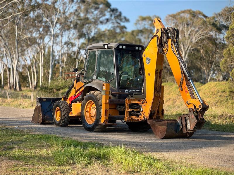 Photo 2. Case 590ST Backhoe Loader