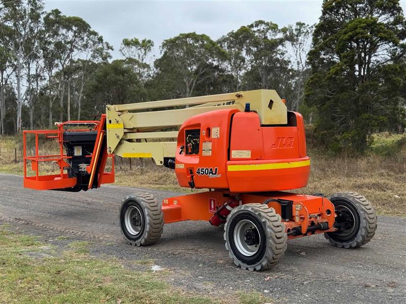 Photo 3. JLG 450AJ 45ft 13.7 knuckle boom scissor lift elevated work platform