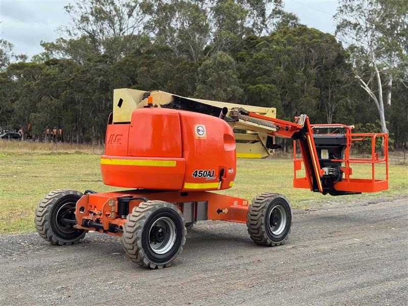 Photo 4. JLG 450AJ 45ft 13.7 knuckle boom scissor lift elevated work platform