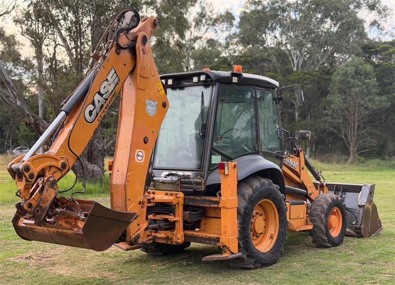 Photo 4. Case 590ST backhoe loader