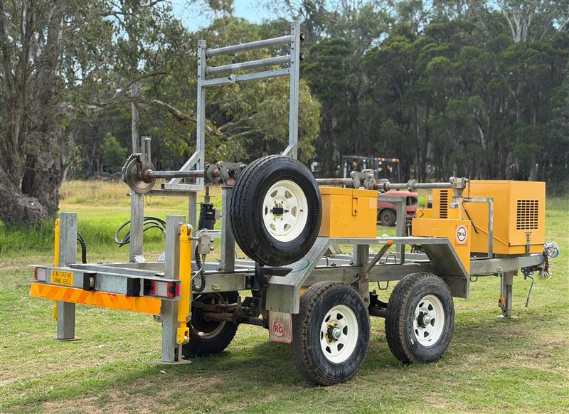 Photo 4. Redmond Gary 3 Drum ABC drum stand cable trailer