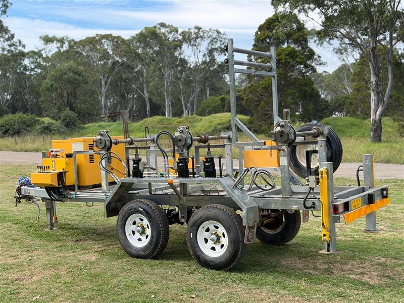 Photo 5. Redmond Gary 3 Drum ABC drum stand cable trailer