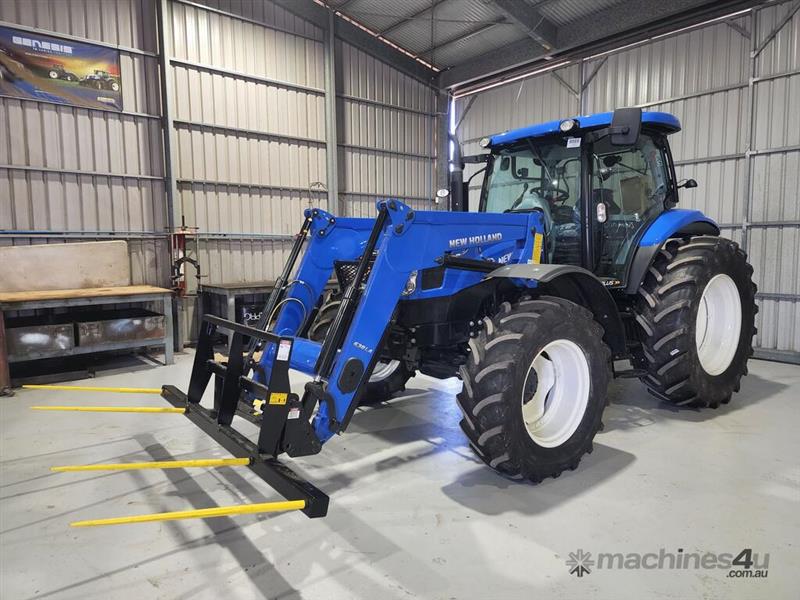 Photo 1. New Holland T6050 FEL tractor