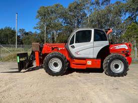 Photo 1. Manitou MT1840 Telescopic Handler