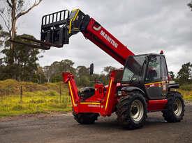 Photo 1. Manitou MT1440 Telescopic Handler