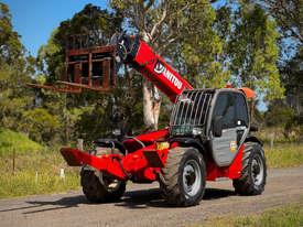 Photo 1. Manitou MT1030 Telescopic Handler