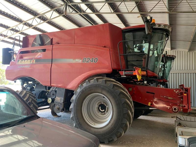 Photo 1. Case IH 8240 with 40ft D65 and trailer combine harvester