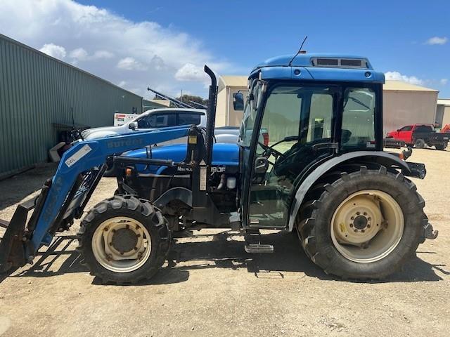 Photo 1. New Holland TN90F tractor