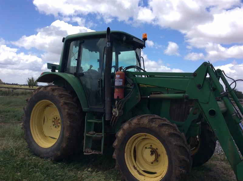 Photo 1. John Deere 6320 tractor