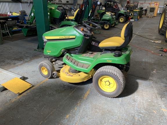 Photo 1. John Deere X304 ride on mower