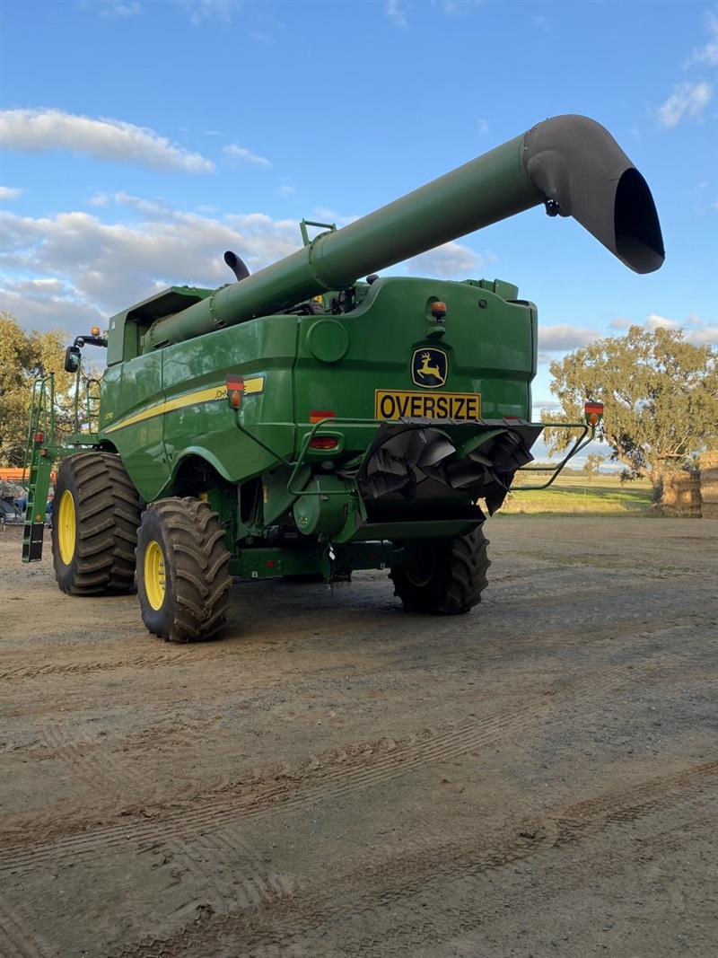 Photo 1. John Deere S790, 740D & trailer package combine harvester