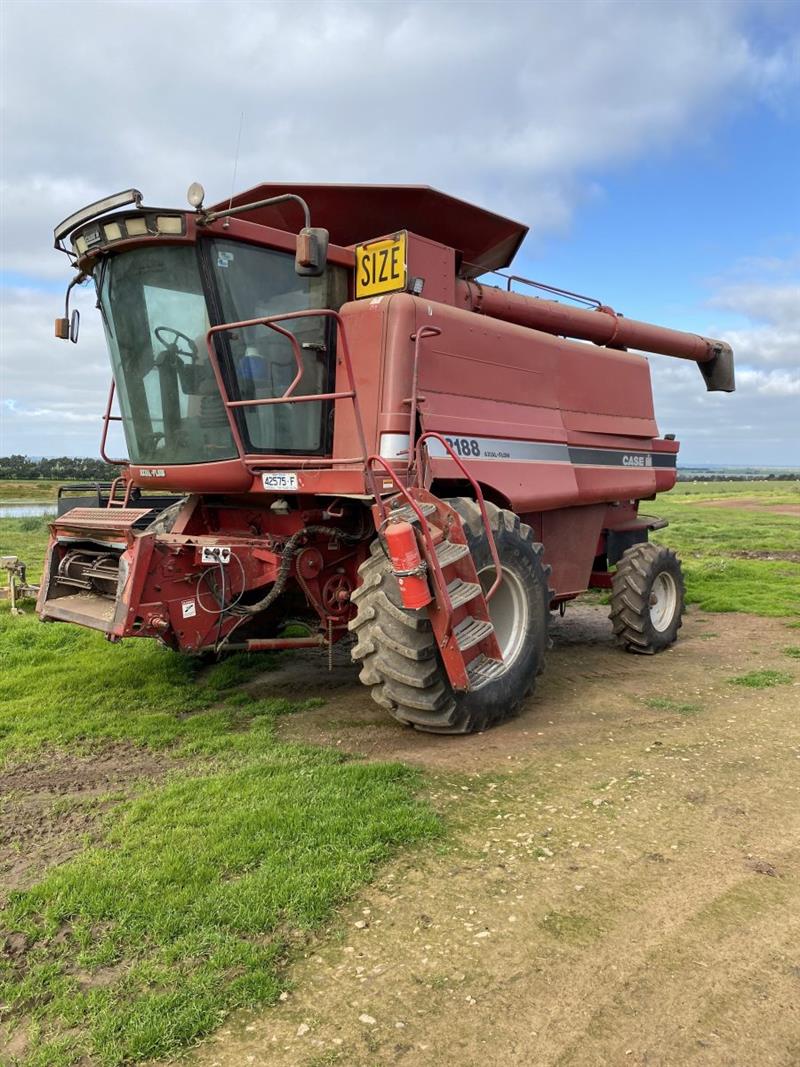 Photo 1. Case IH 2188, 1020 & trailer package combine harvester