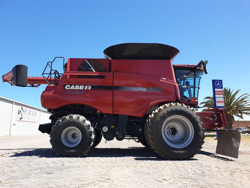 Photo 5. Case IH 8240 Axial Flow Combine and Case IH 3050 Vario front 41ft combine harvester