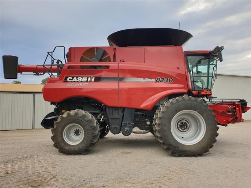 Photo 5. Case IH 8240 Axial Flow Combine with Case IH 3050 Vario front 41ft combine harvester