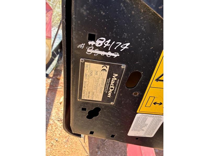 Photo 3. Macdon D65 harvester front