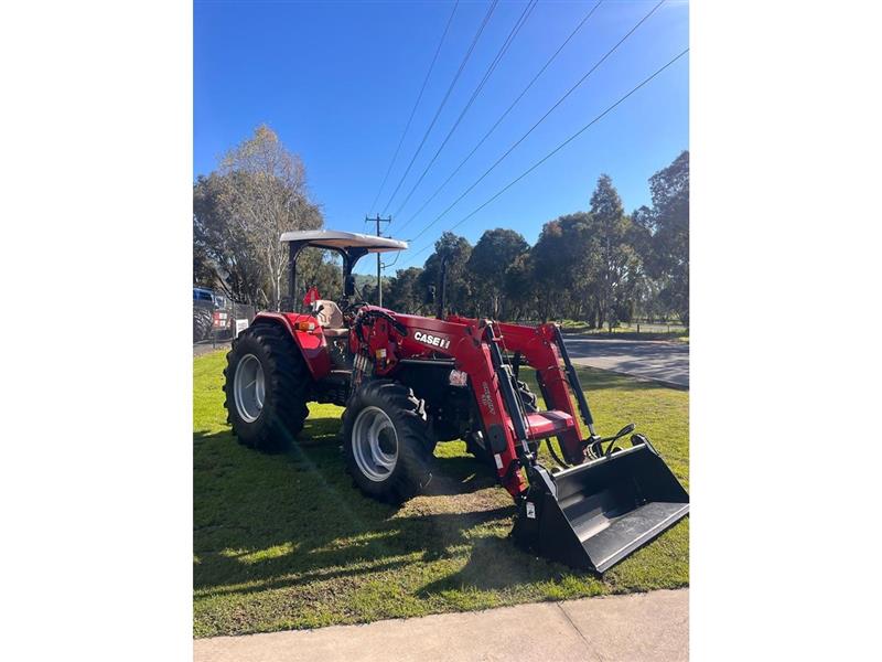 Photo 2. Case IH JXM 90 tractor with Challenge loader