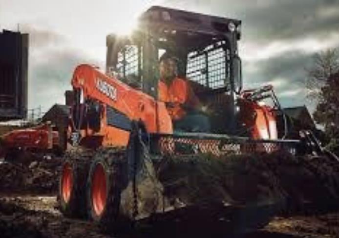 Photo 2. Kubota SSV75 skid steer loader