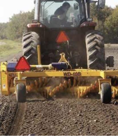 Photo 2. S Houle Fabrication Rock Rakes / WIndrower