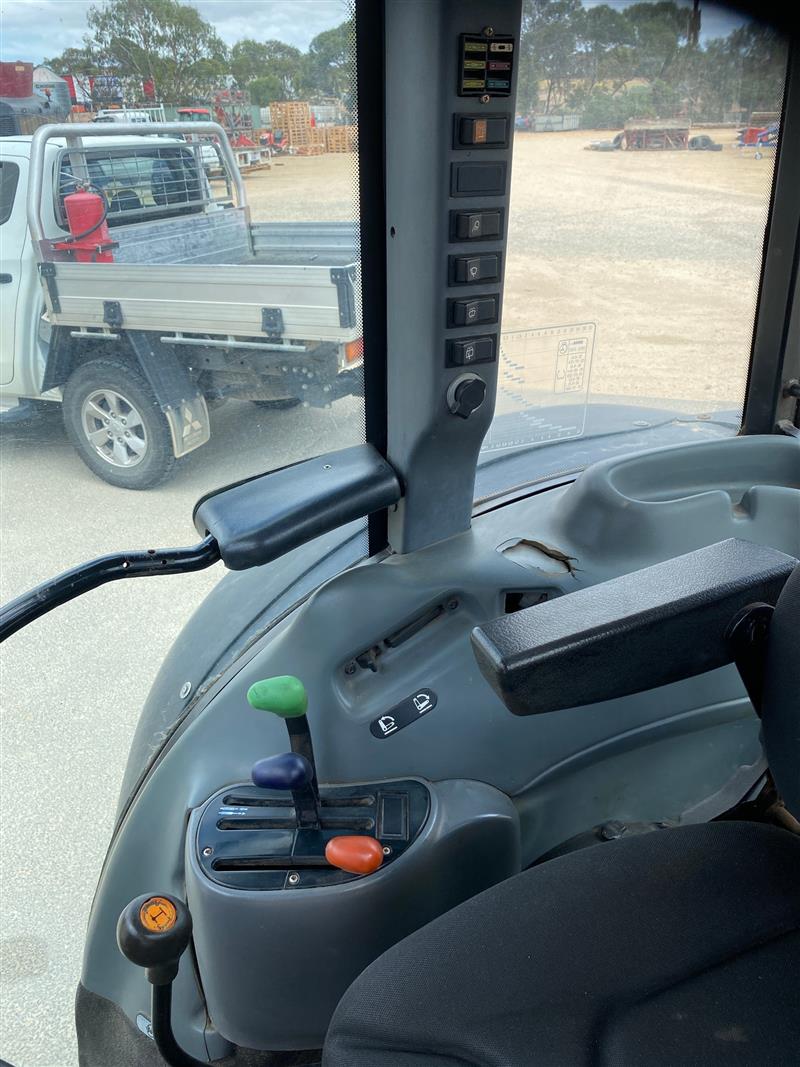 Photo 3. New Holland TN65D cab tractor