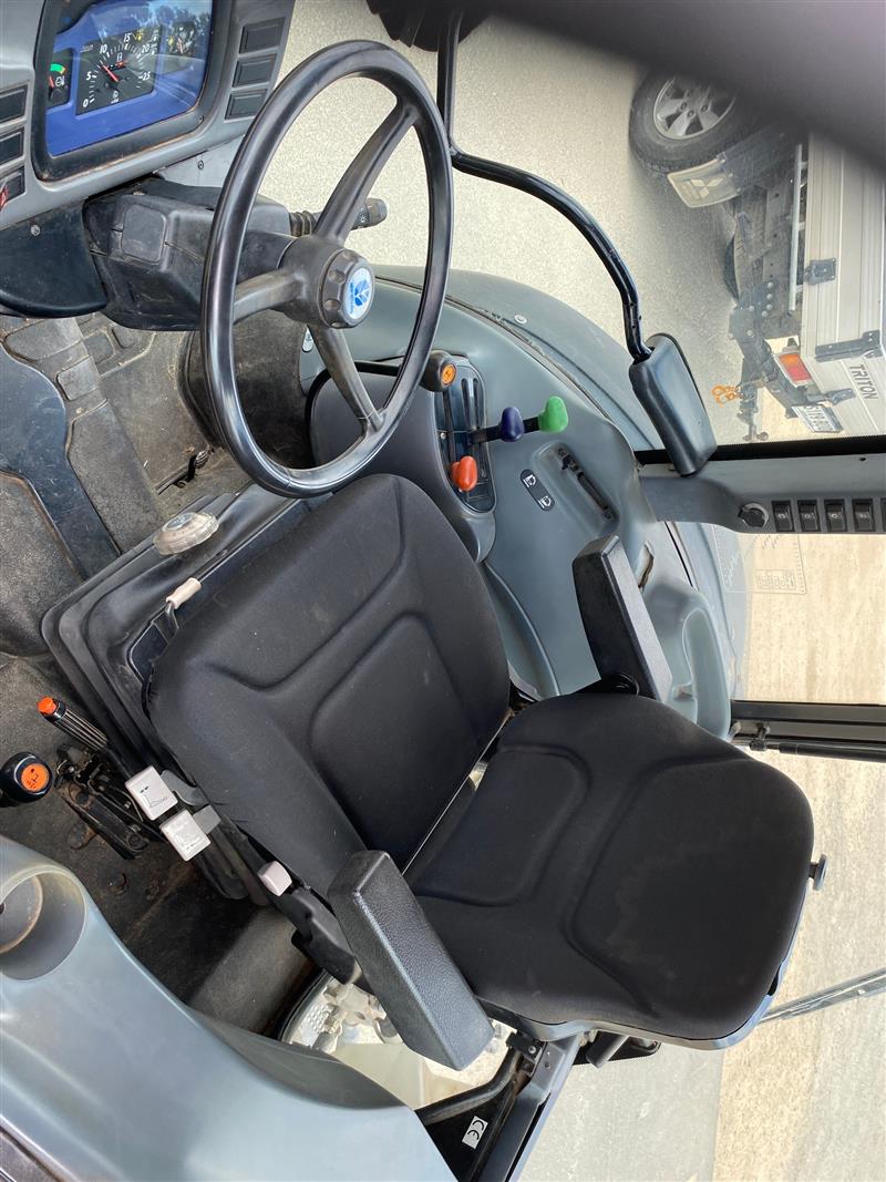 Photo 4. New Holland TN65D cab tractor