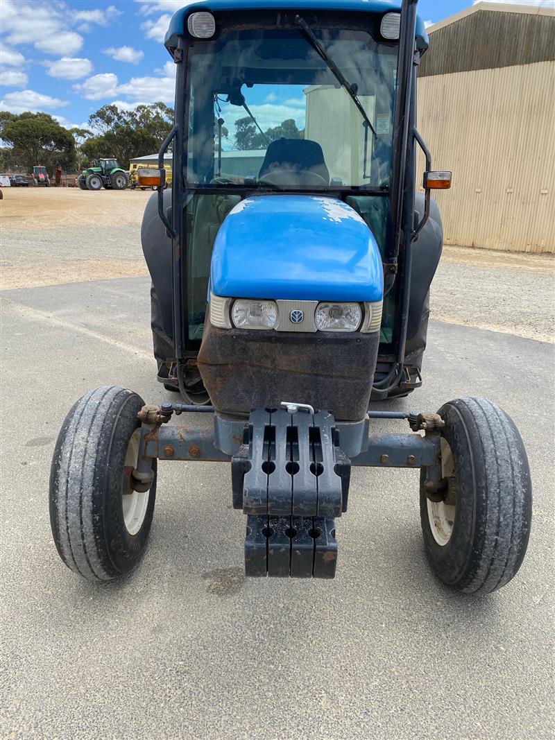 Photo 5. New Holland TN65D cab tractor
