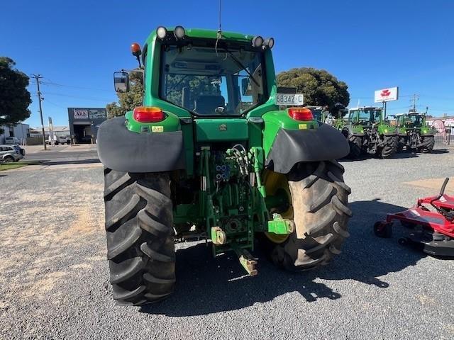 Photo 4. John Deere 6520 tractor