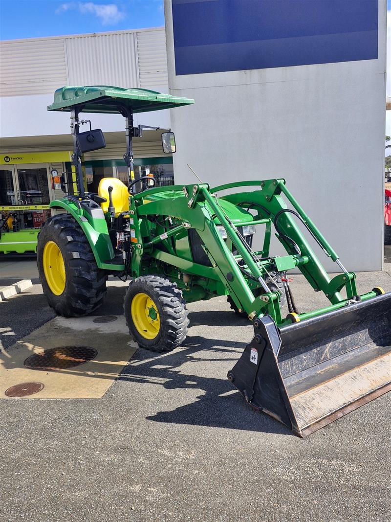 Photo 4. John Deere 4049M cab tractor