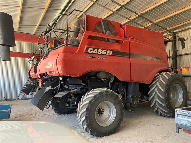 Photo 3. Case IH 8240 with 40ft D65 and trailer combine harvester