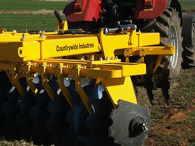 Photo 3. Countrywide Industries 6 - 4 + 8 - 4 Series Rigid Tandem Ploughs