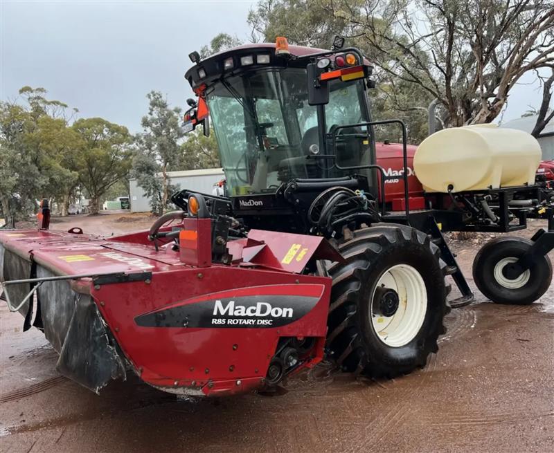 Photo 3. MacDon M205 windrower
