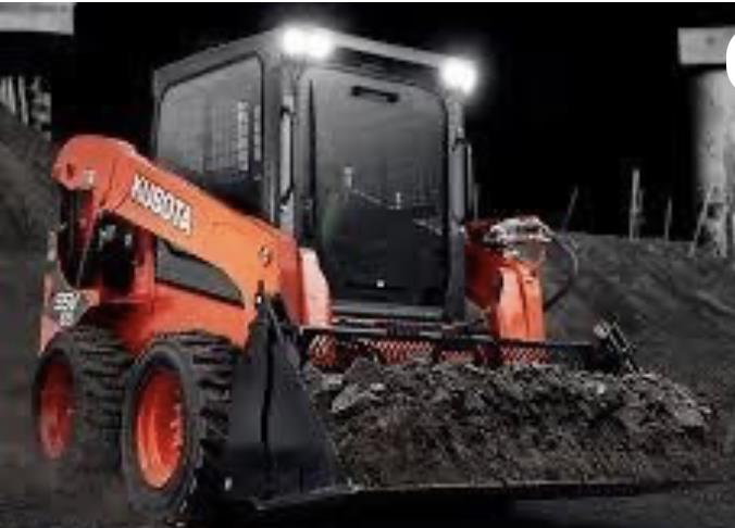 Photo 3. Kubota SSV75 skid steer loader