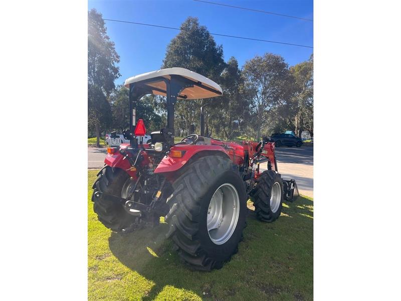 Photo 4. Case IH JXM 90 tractor with Challenge loader