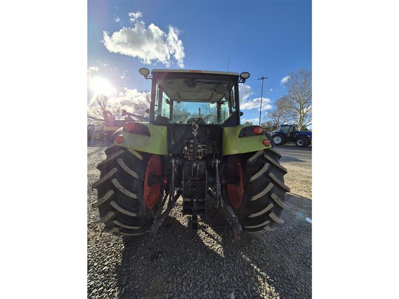 Photo 4. CLAAS AXOS 320 Tractor