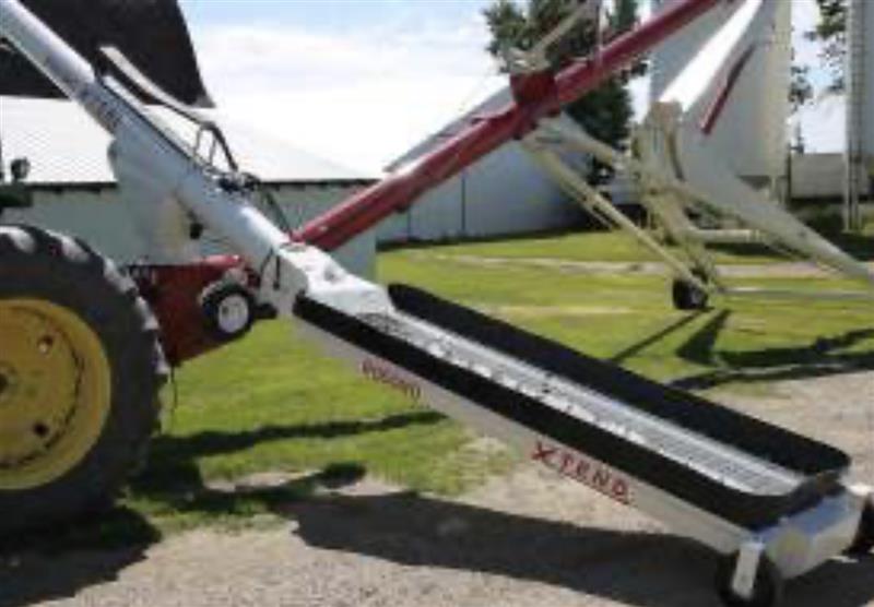 Photo 4. Farm King Swing Away Grain Augers