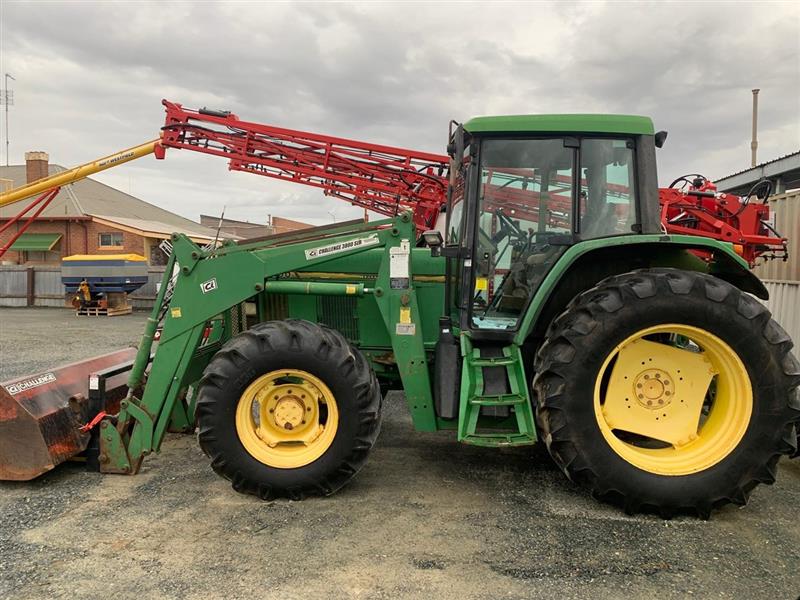 Photo 4. John Deere 6600 tractor and loader