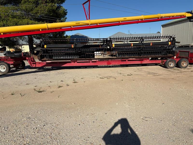 Photo 4. MacDon D60 windrower