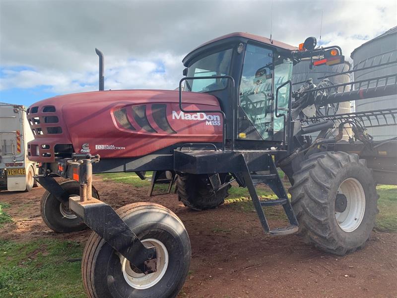 Photo 2. MacDon 155 self propelled windrower