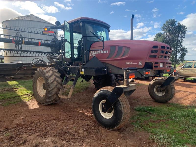 Photo 3. MacDon 155 self propelled windrower