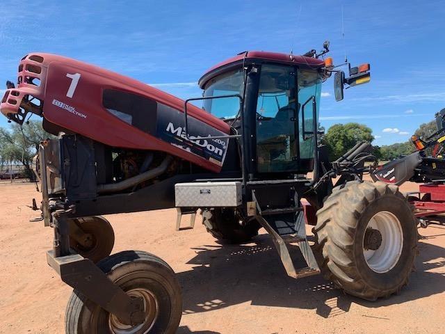 Photo 2. MacDon M200 40ft windrower