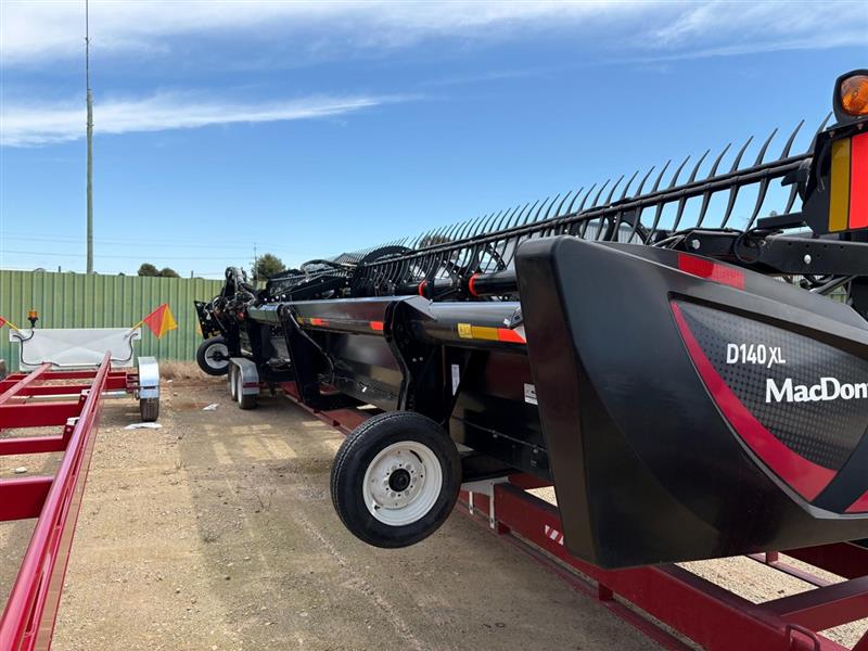 Photo 2. MacDon D140XL harvester front