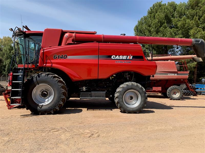 Photo 2. Case IH 6140 Axial Flow Combine & MacDon FD135 Front