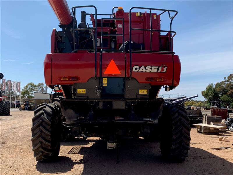 Photo 3. Case IH 6140 Axial Flow Combine & MacDon FD135 Front